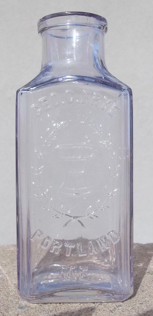 Purpled Geo. C. Frye Druggist Bottle from Portland, Maine