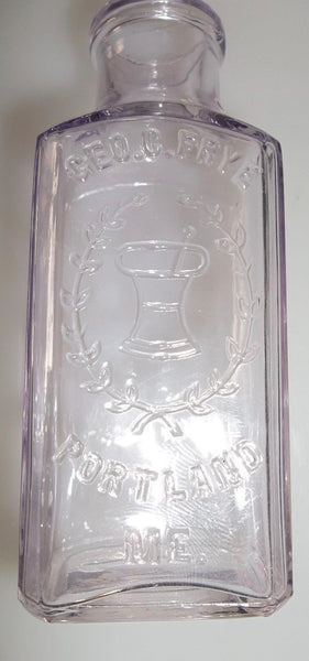 Purpled Geo. C. Frye Druggist Bottle from Portland, Maine